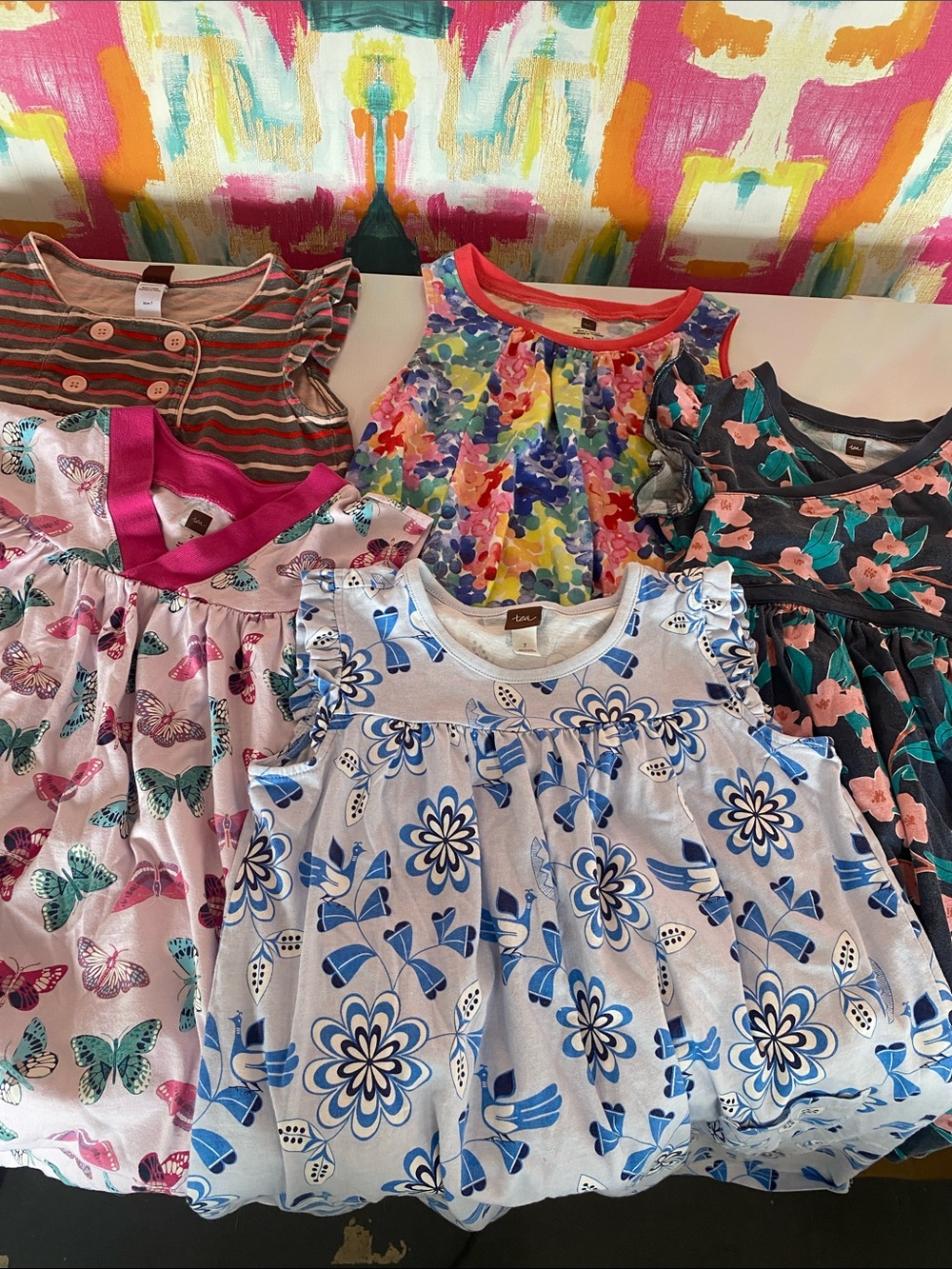 5 Assorted Girls' Summer Dresses. Tea brand. Size 7. Good condition.